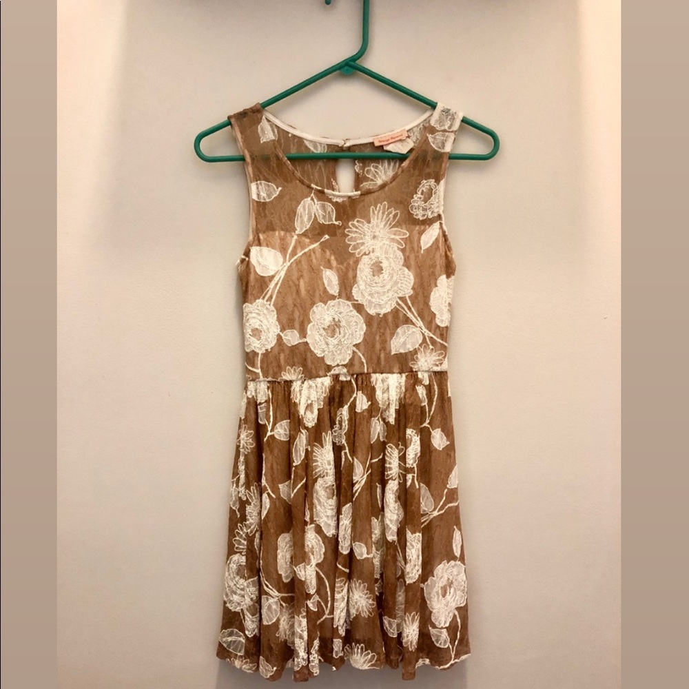 Tan, lace dress with floral design